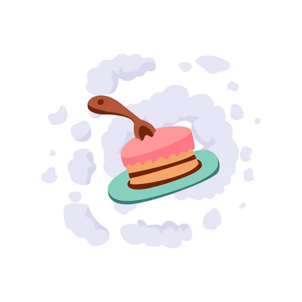 Un pequeño pastel con una cuchara de madera . — Foto de stock gratis