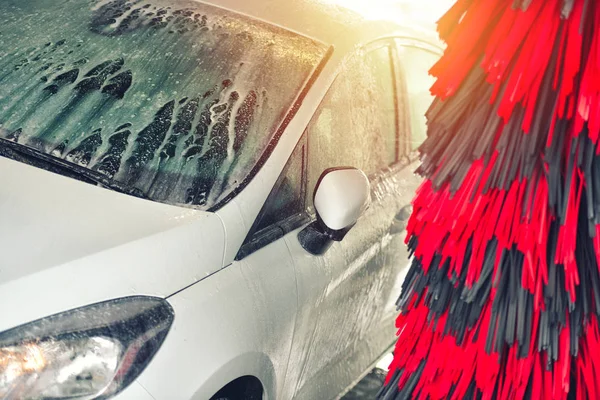 Automatic car wash in action. Car wash concept. Automated technology — Stock Photo, Image