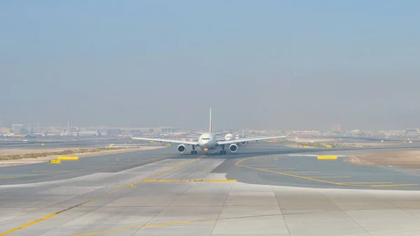 Queue Planes Takeoff Morning Haze Stock Image