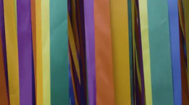 Colorful Satin Ribbons Swaying In The Gentle Breeze, aesthetic footage ideal for wedding decor, celebration campaigns, and cinematic advertising.