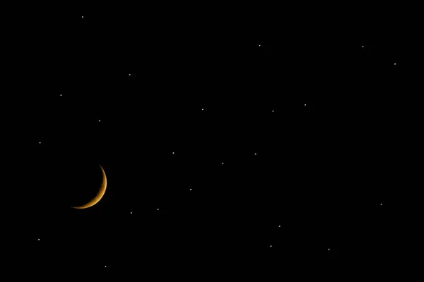 New moon and stars on black background