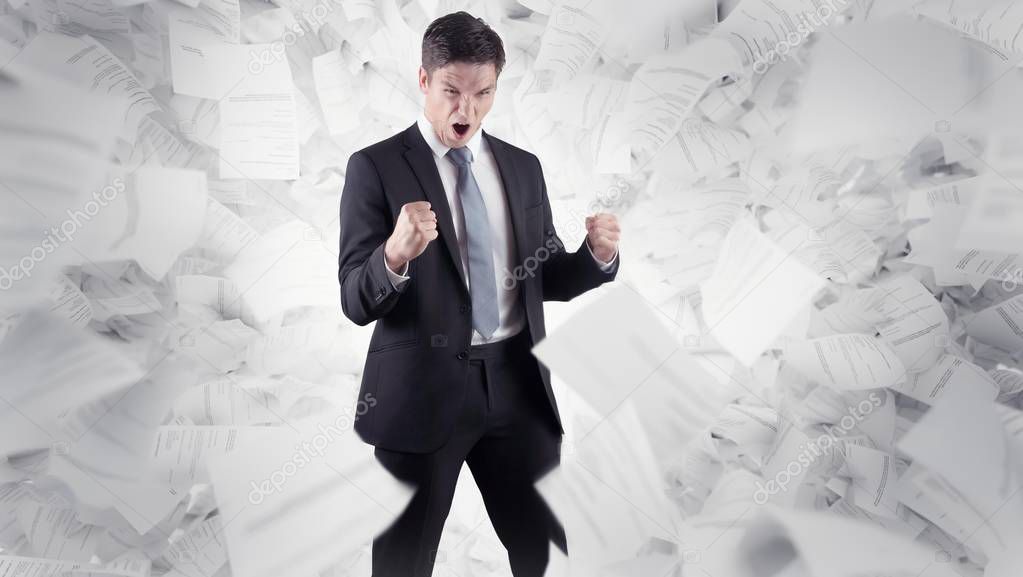 businessman in front of white background and flying documents