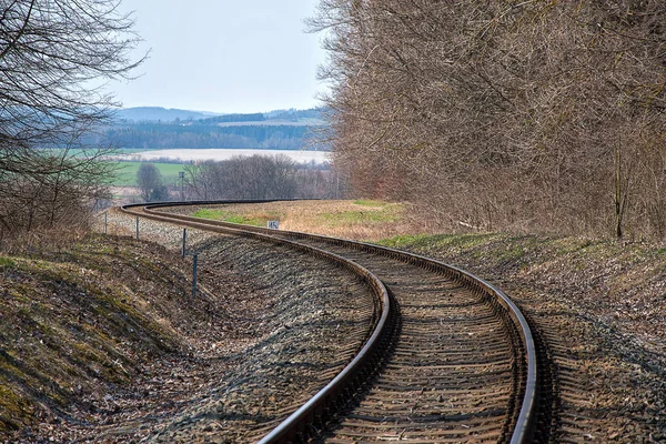 Railroad tracks. Construction of railway tracks. Railway infrastructure. Winding railroad tracks. Sunny weather.