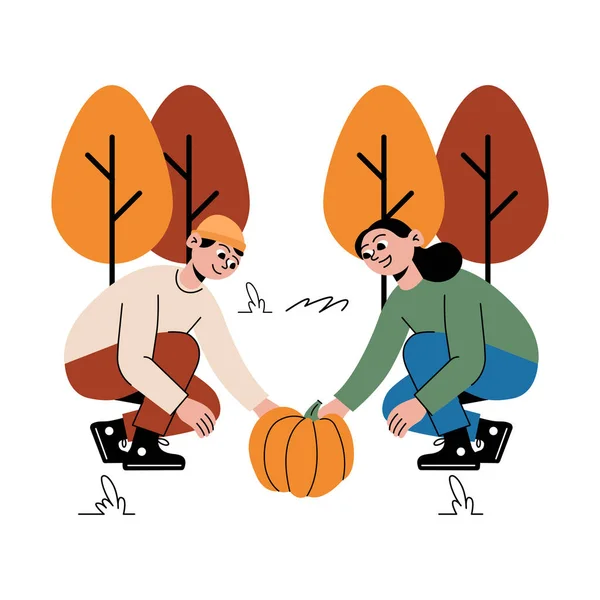 Sonbahar parkında balkabağı tutan bir çift.