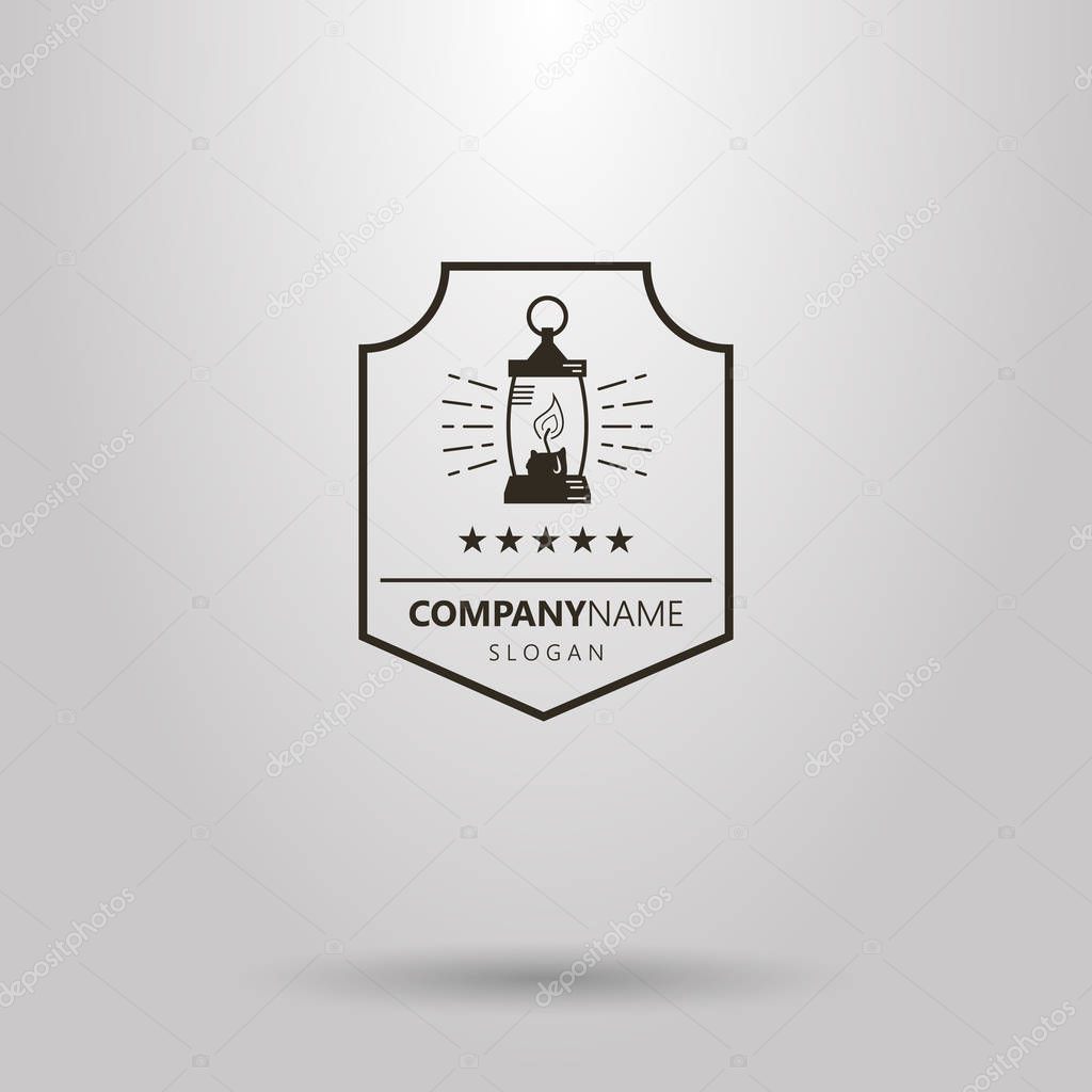 Black and white simple vector logo of oil lamp in a shield frame