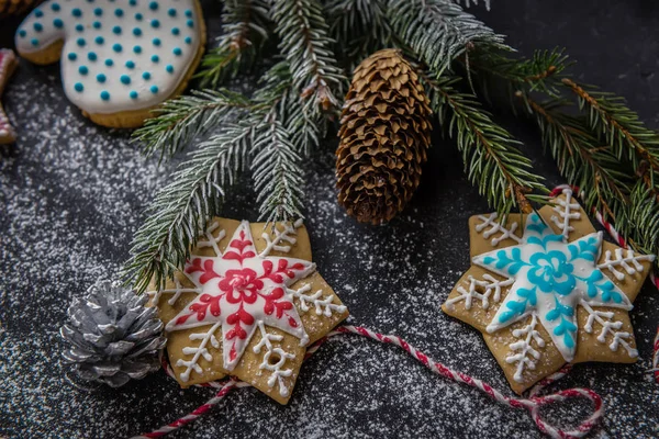 Christmas card, splash screen. Christmas tree and gingerbread on a light background. New year celebration and christmas conceptFlat lay with bright christmas decoration. New year celebration and christmas concept