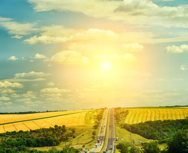 The route stretches upwards and open spaces of different pole with harvested crops along the road. The route Kiev-Odessa. Route E95. — Stock Image Route Stretches Upwards Open Spaces Different Pole Harvested Crops Road Royalty Free Stock Photos