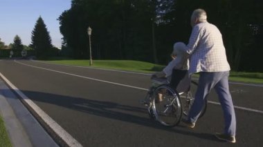 Üst düzey karı iplik koca tekerlekli sandalye Park Tarih