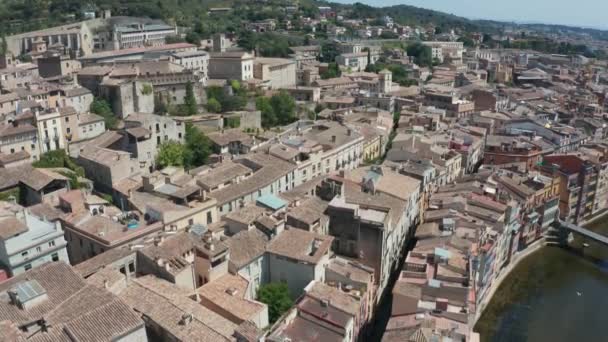 Drone view of old town houses near river in Girona — Stock Video