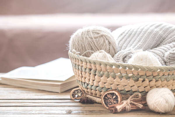 cozy warm still life with decor in the living room, the concept of home comfort