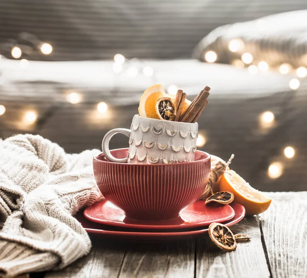 still life with home Christmas decor in the living room on a wooden table, the concept of celebration and home comfort