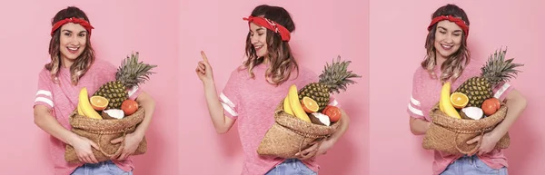 Collage met vrouw en fruit op roze achtergrond — Stockfoto