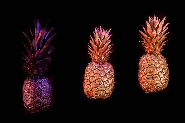 Black and gold pineapple on black background