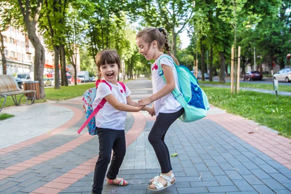 Back to school education concept with girl kids, elementary stud