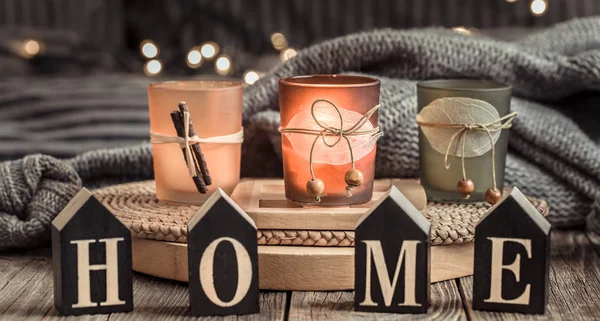 Cozy background with wooden letters with the inscription home. — Stock Photo, Image