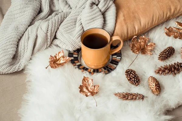 Still life Cup of tea with autumn leaves and sweater. — Stock Photo, Image