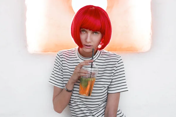 Portrait Beautiful Girl Red Wig Drinking Juice Stock Image