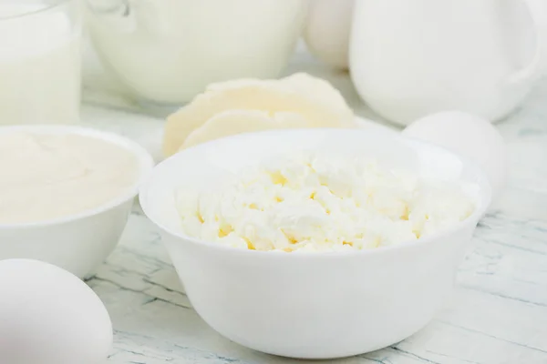 Different Dairy Products White Wooden Boards Blurred Background — Stock Photo, Image