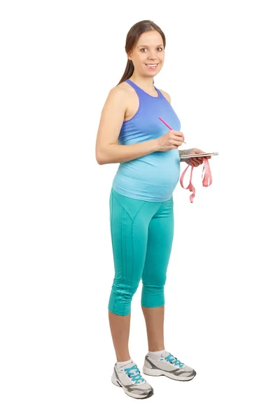 Elinde Mezurası Olan Beyaz Tenli Hamile Bir Kadın — Stok fotoğraf