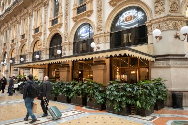Milan, November 2018: Luxury restaurant opened by the famous Italian chef Carlo Cracco in shopping mall Vittorio Emanuele II Gallery, on November 2018 in Milan, Italy  clipart