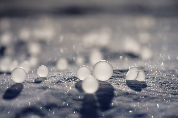 frozen soap bubble in winter