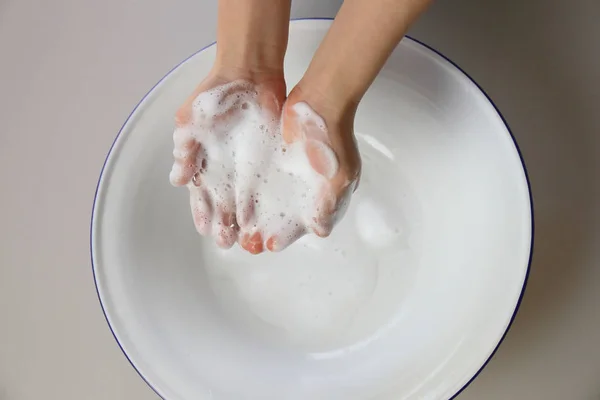 Wash your hands with foam