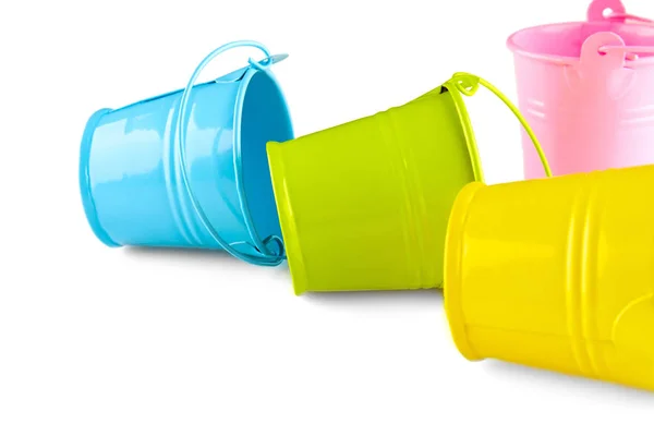 four colorful plastic buckets with handles on a dark background.  AI-Generated 33428160 Stock Photo at Vecteezy