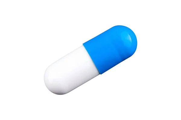 Macro foto van blauwe en witte capsule. Geïsoleerd — Stockfoto