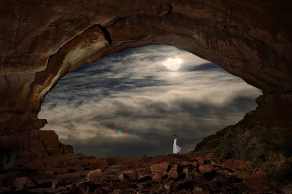 Woman White Dress Window Arch Full Moon Clouds Arches National — Stock Photo, Image