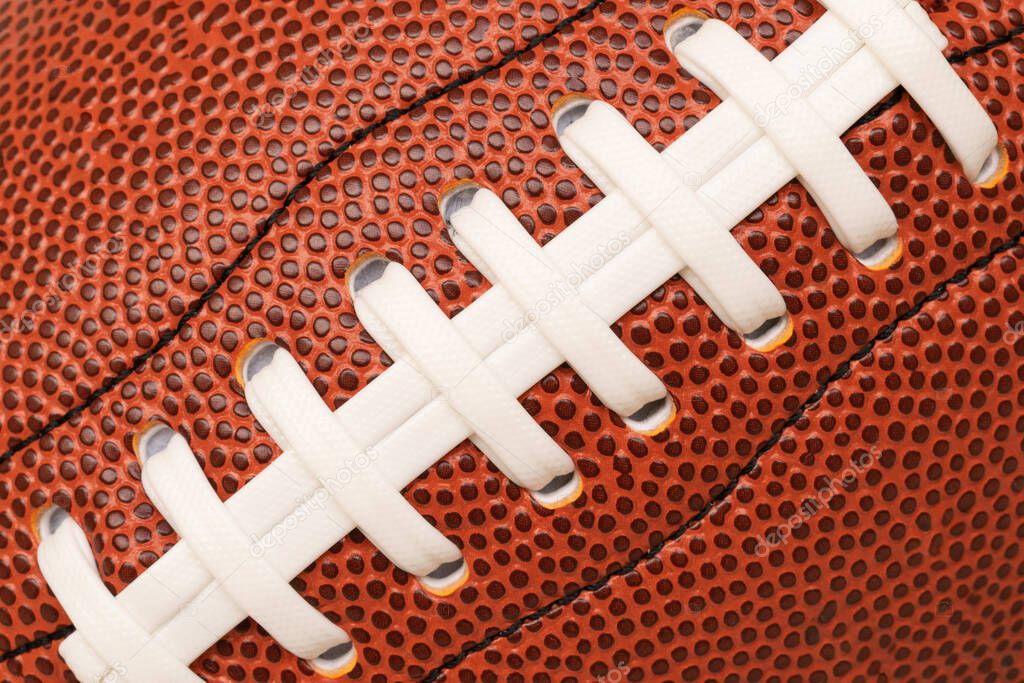 Close-up or marco shoelace of American leather football, full frame, rugby ball.