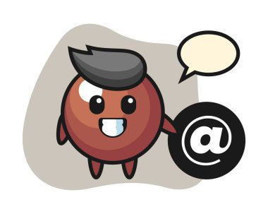 Çikolata topu çizgi filmi sembolün yanında duruyor.