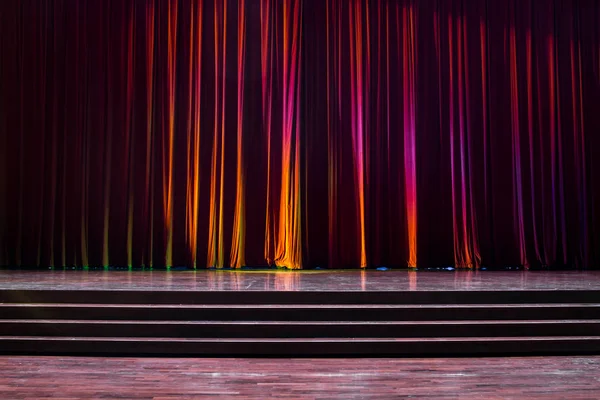 Stage wood and red curtains.