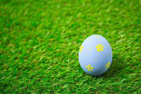 Easter eggs on the green grass.