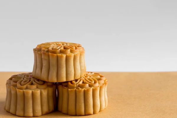 Moon cake on white and brown background