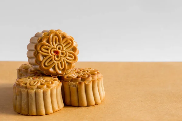 Moon cake on white and brown background