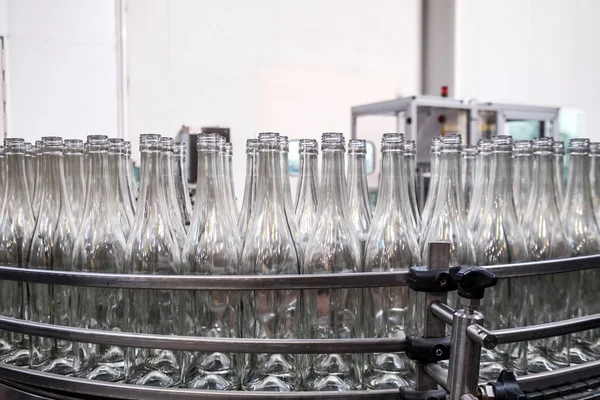 Wine production line - unlabeled bottles — Stock Photo, Image