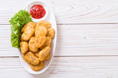 Soslu tavuk nugget, sağlıksız yemek.