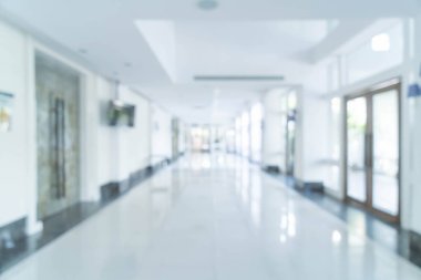 Bulanık arka plan iç görüntülemek için boş ofis lobi ve giriş kapı ve cam Giydirme Cephe çerçevesi - mavi beyaz dengesi işleme tarzı ile doğru bakan