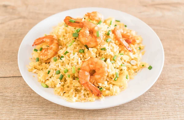 fried rice with shrimps on white plate