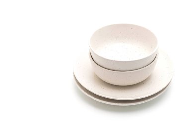 boş levha ve beyaz arka plan üzerinde izole kase