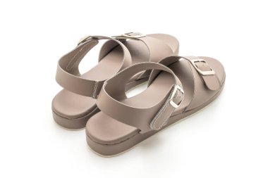 Kadınlar beyaz arka plan üzerinde izole sandalet deri