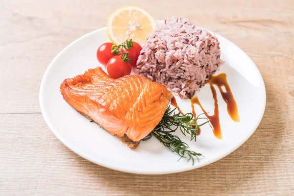 Salmon Steak with Berry Rice on plate