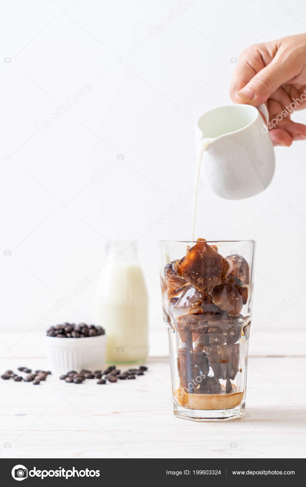 Coffee Ice Cubes Milk Wood Table Stock Photo Topntp 199603324 Coffee Ice Cubes Milk Wood Table Stock Image
