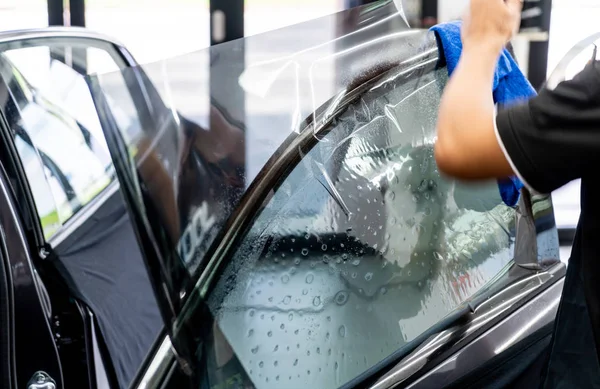 installs a tint film for the car glass - selective focus point