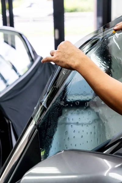 installs a tint film for the car glass - selective focus point