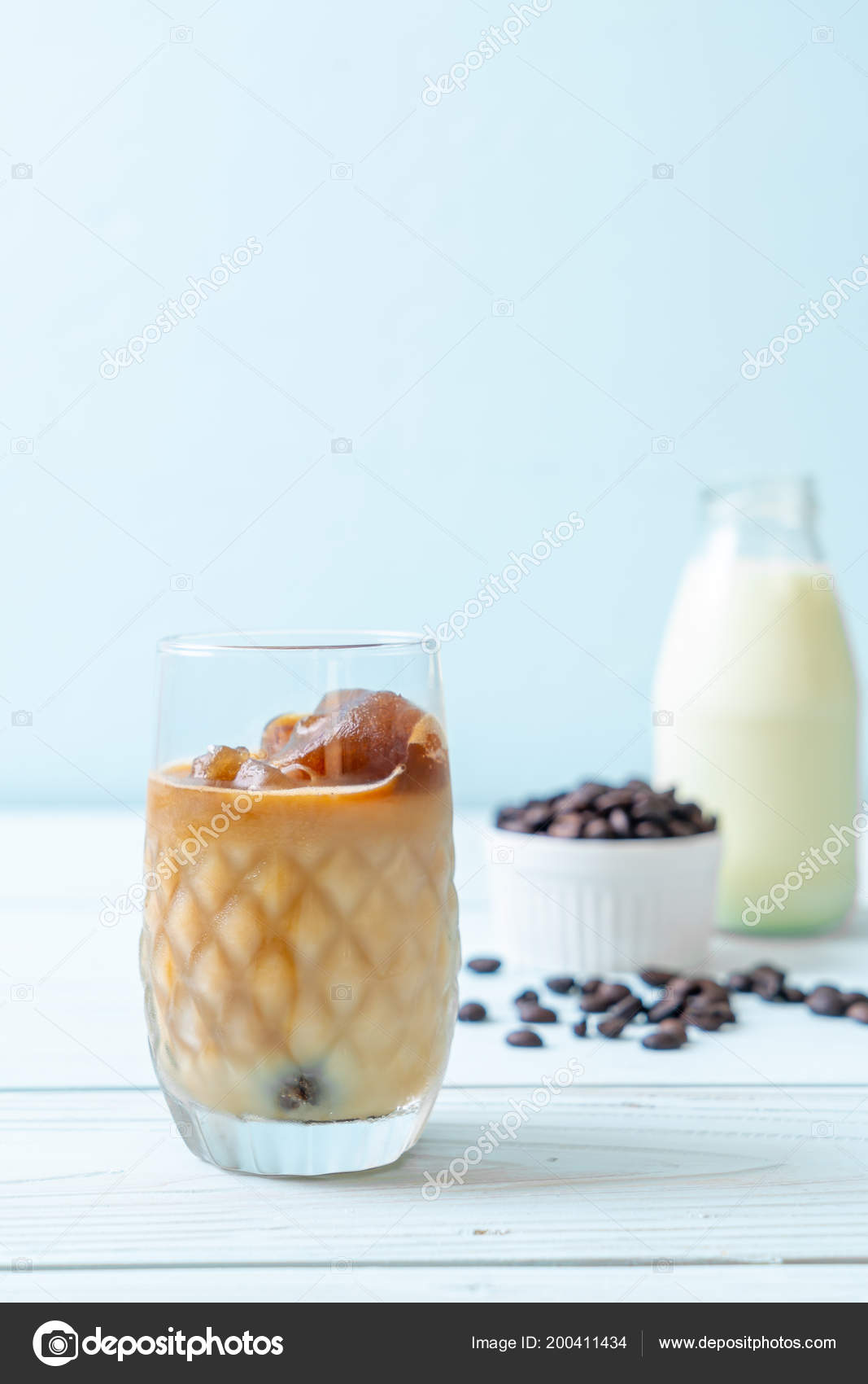 Coffee Ice Cubes Milk Wood Table Stock Photo Topntp 200411434 Coffee Ice Cubes Milk Wood Table Stock Image