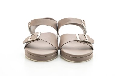 Kadınlar beyaz arka plan üzerinde izole sandalet deri