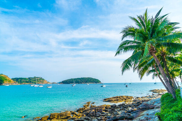 Beautiful tropical beach and sea with coconut palm tree in paradise island - Holiday Vacation concept