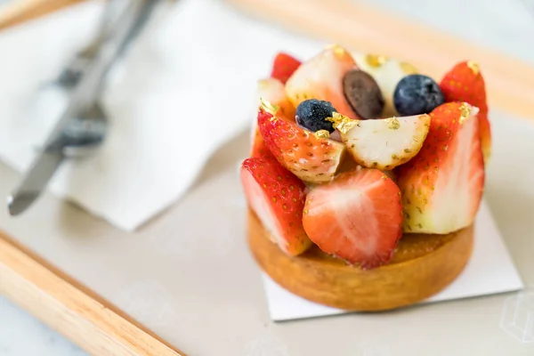 close-up strawberry tart  dessert on wood tray