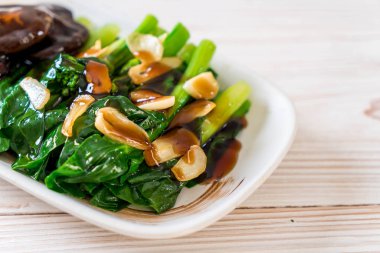 Sarımsaklı istiridye soslu kızarmış Hong Kong Kale heyecan